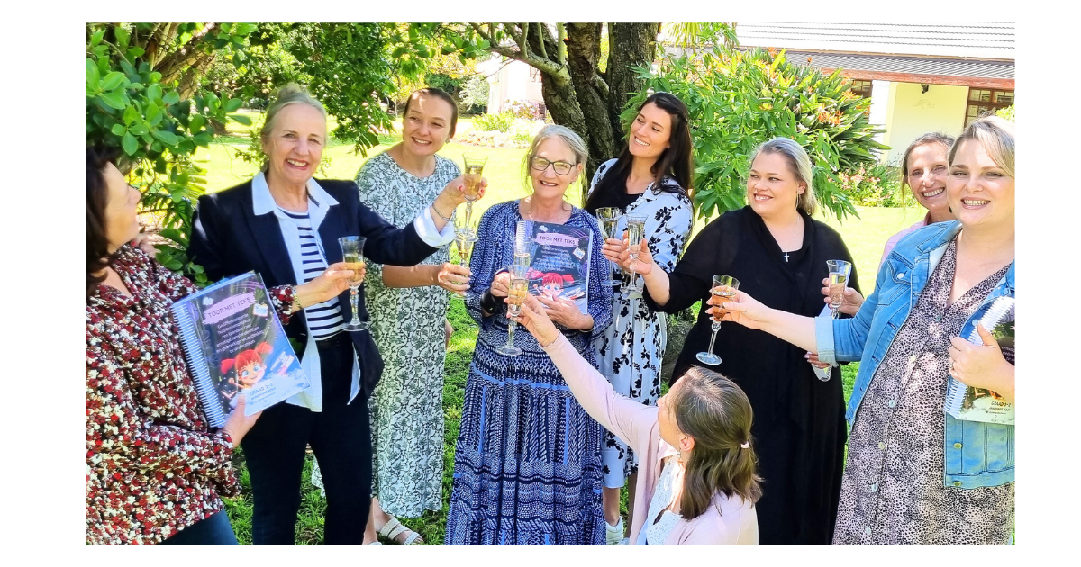 Teachers celebrating at the end of a Yellow Tree workshop